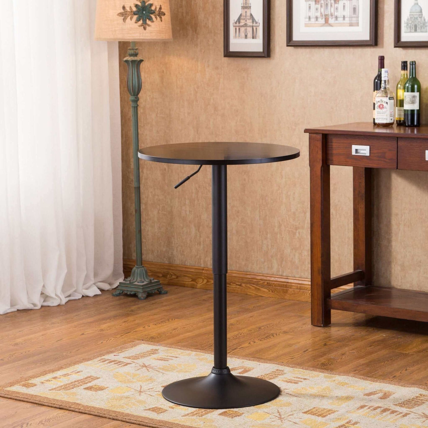 Adjustable height black bar table in a stylish dining room setting