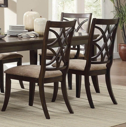 Cherry finish formal dining set with extension table and six chairs, featuring elegant wood detailing and matching fabric seat cushions.