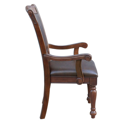 Side view of brown cherry finish traditional dining chair with upholstered seat and carved wooden armrest.