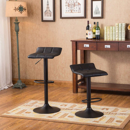 Belham Black round top adjustable height bar table and 2 swivel stools in a dining room setting with decorative elements