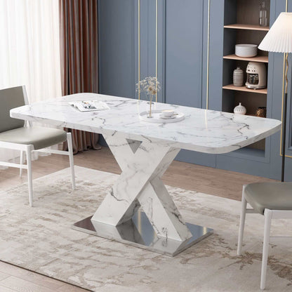 Modern stretchable white marble dining table with metal base in stylish dining room setting