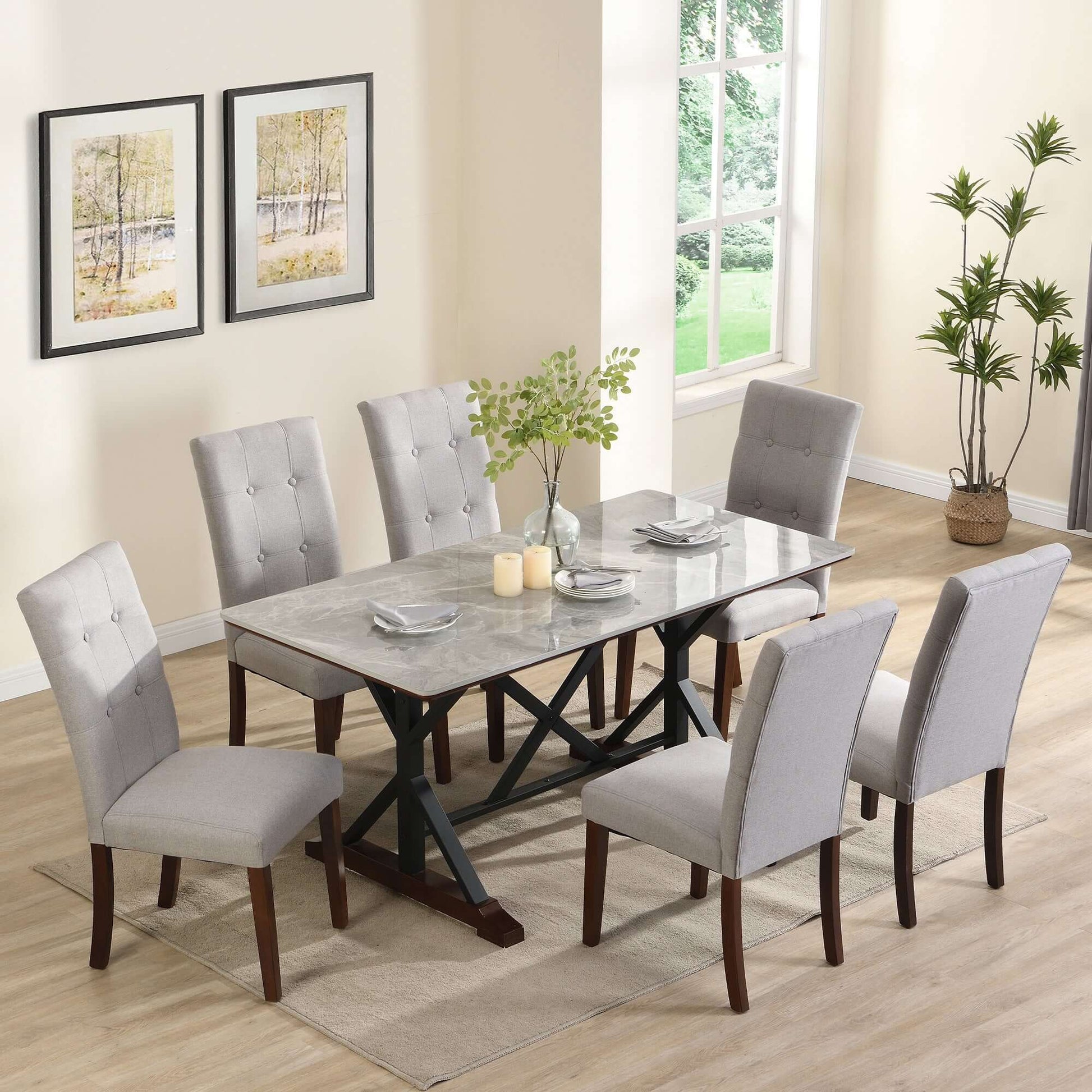 Modern 7-piece dining table set with gray sintered stone table and six tufted upholstered chairs in dining room.