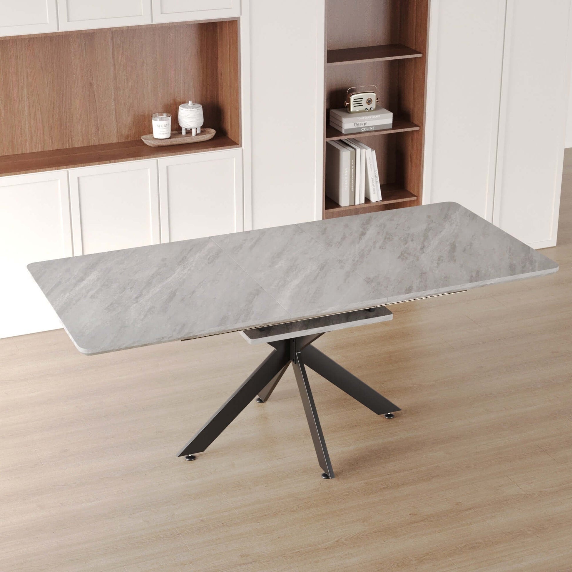 Extendable dining table with a grey and white marble-like top and modern black metal legs, ideal for dining room or kitchen.