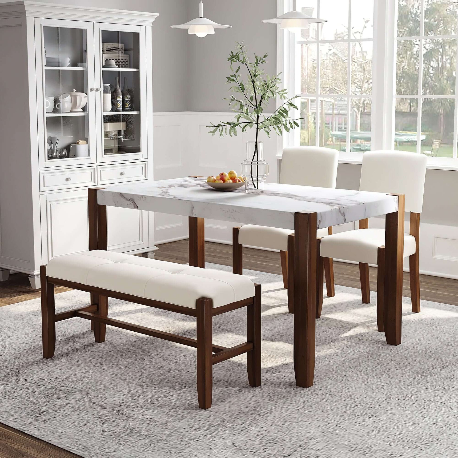 4-piece modern dining furniture set with faux marble table, two upholstered chairs, and bench with wood legs in stylish kitchen.