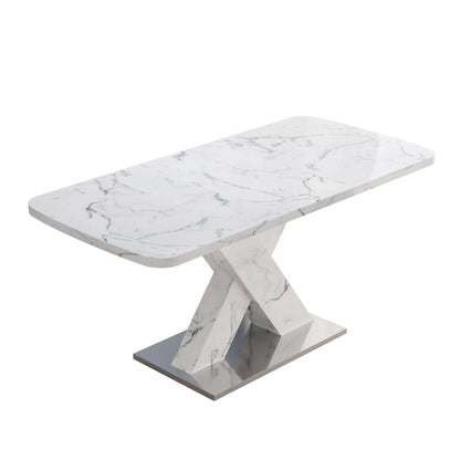 Modern stretchable white marble dining table with a sturdy metal base.