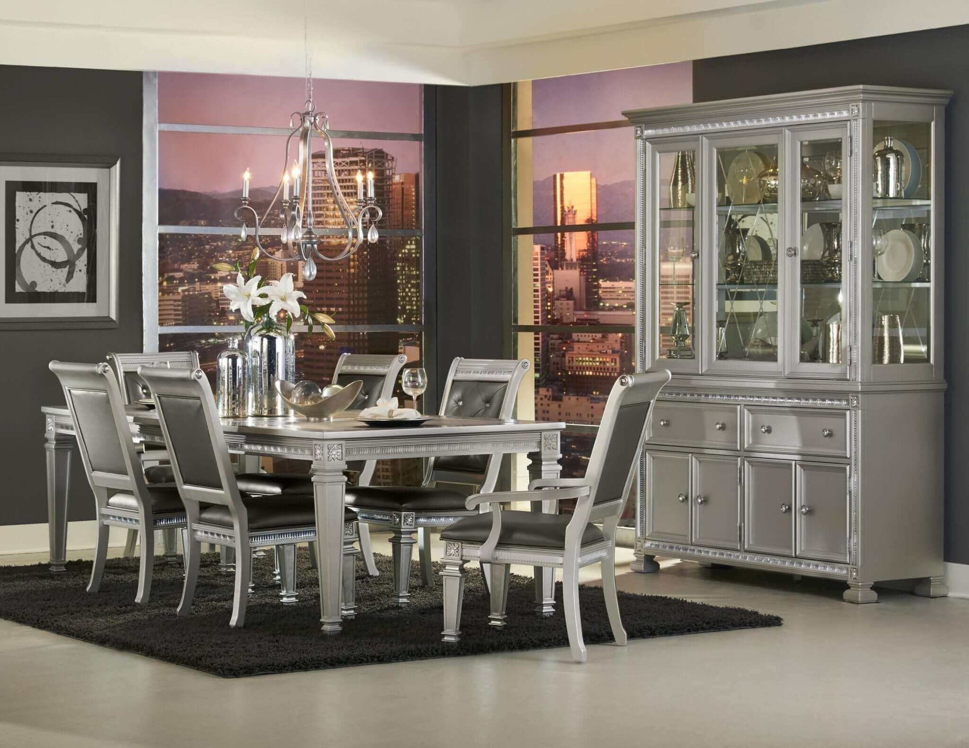 Silver Finish 7pc Dining Set with table, two armchairs, and four side chairs in a modern dining room with city view.