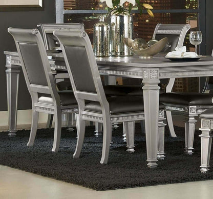 Silver finish 7pc dining set with table, 2 armchairs, and 4 side chairs in a modern dining room setting