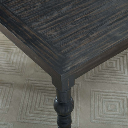 Close-up of Leviton Urban Style dark wash wood dining table showcasing elegant texture and design.