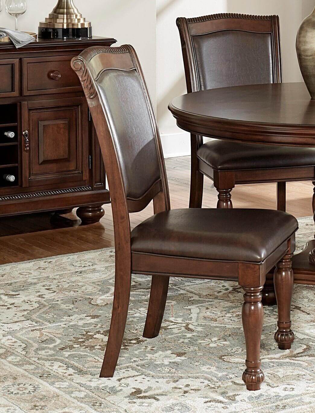 Traditional style brown cherry dining chair with upholstered seat and wooden legs, part of 5-piece dining set.