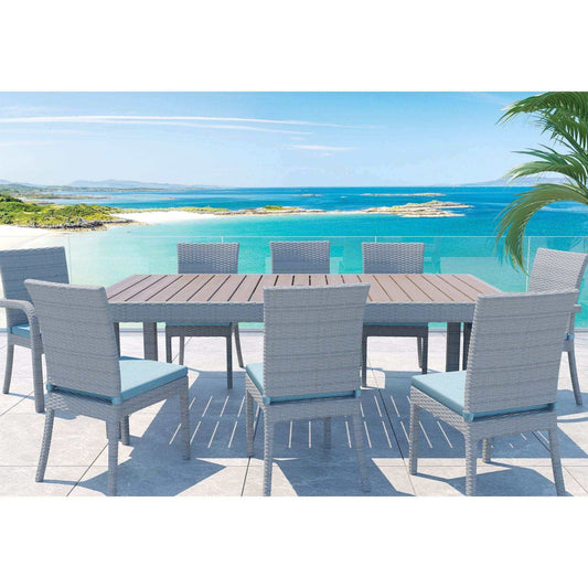 Balcones 9-piece outdoor dining table set with 8 chairs, featuring gray wicker and aqua cushions, positioned poolside with scenic ocean view