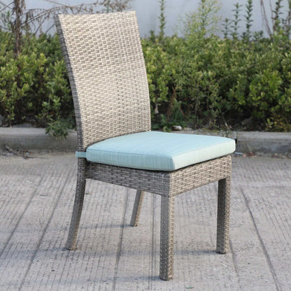 Grey wicker outdoor dining chair with an aqua cushion from the Balcones 9-Piece Outdoor Dining Table Set