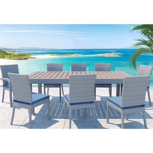 Balcones 9-Piece Outdoor Dining Table Set with 8 Gray and Navy Chairs by the Pool and Ocean.